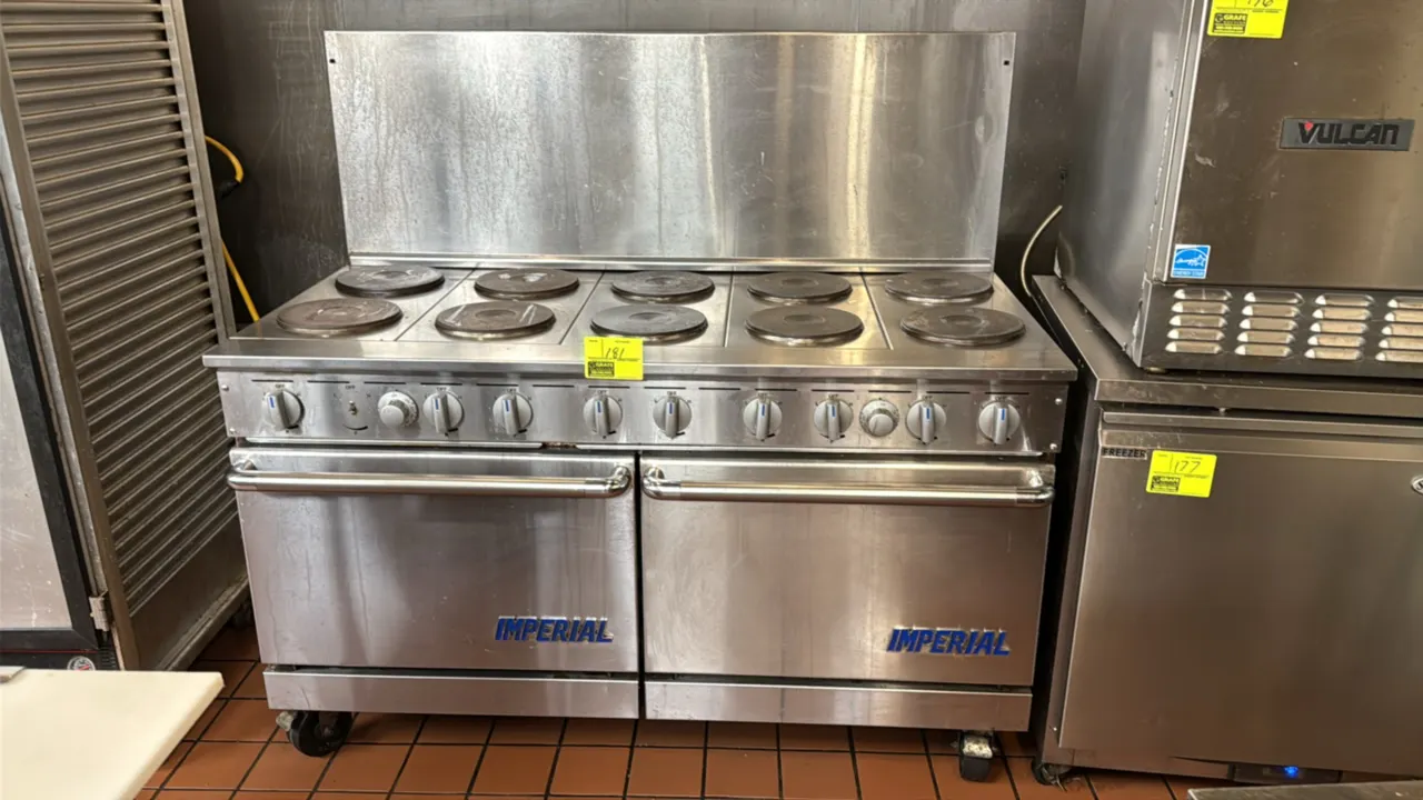 Imperial 60" 10-burner electric range with double oven. Features stainless steel construction, 10 solid round hot plate burners, dual ovens, and a rea