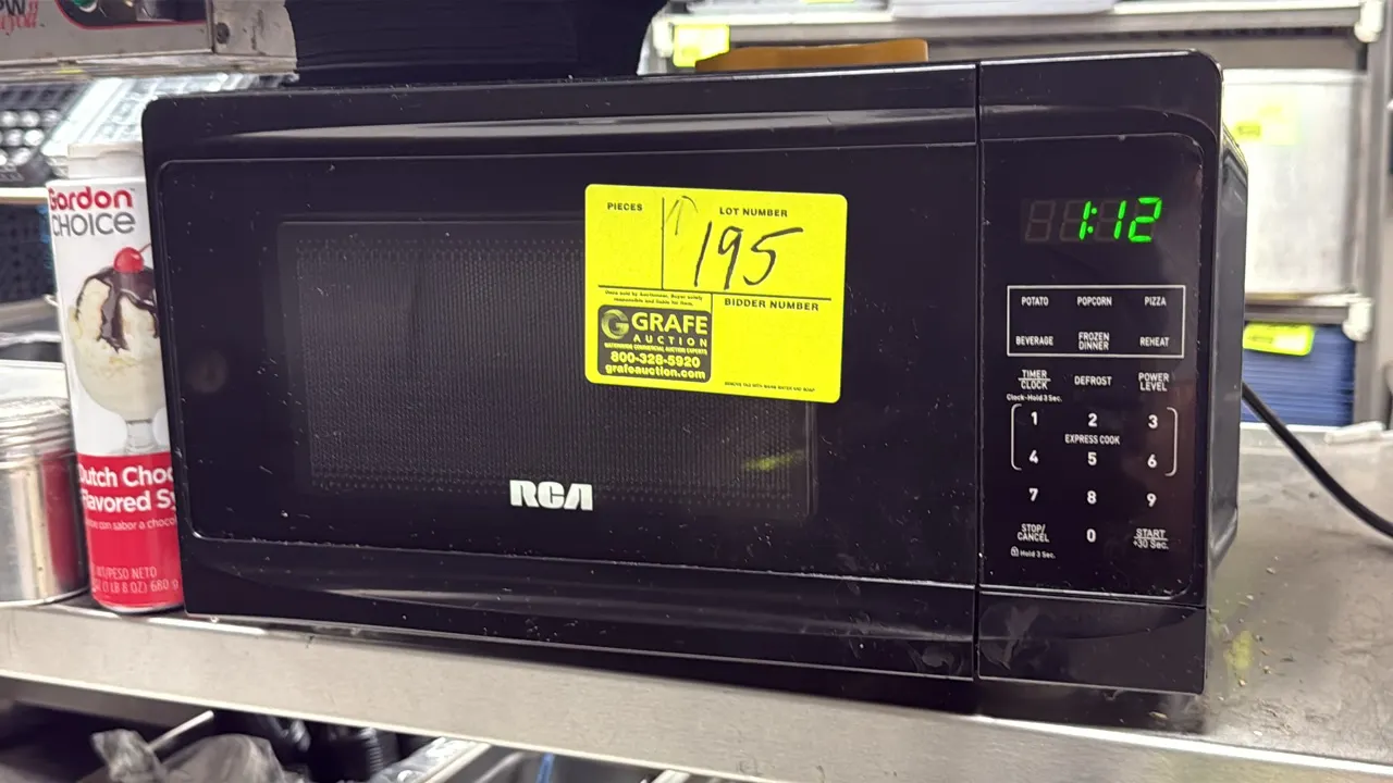 RCA countertop microwave oven. Features digital display, digital keypad with preset cooking functions, and interior glass turntable tray. 16"W. Electr