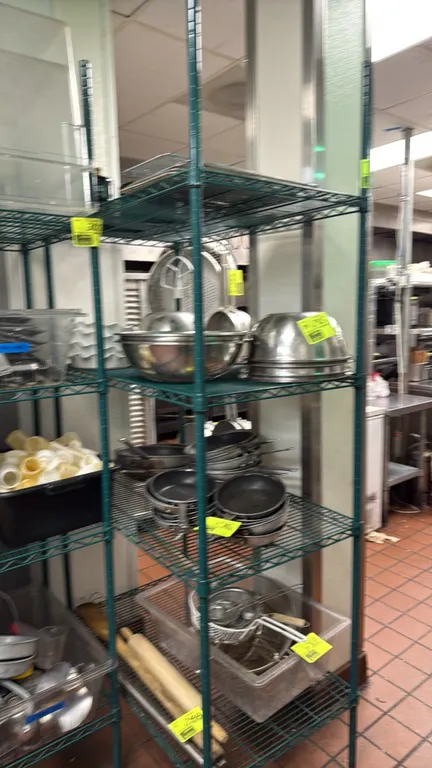 Focus 4-tier wire shelving rack. Features green epoxy finish and adjustable wire shelves. 42" x 24" x 86". NSF certified. Contents not included.