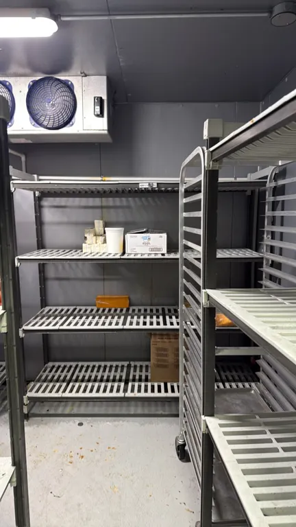 4-tier vented shelving racks. Features vented plastic shelf plates and composite upright posts. 72". Contents not included.
