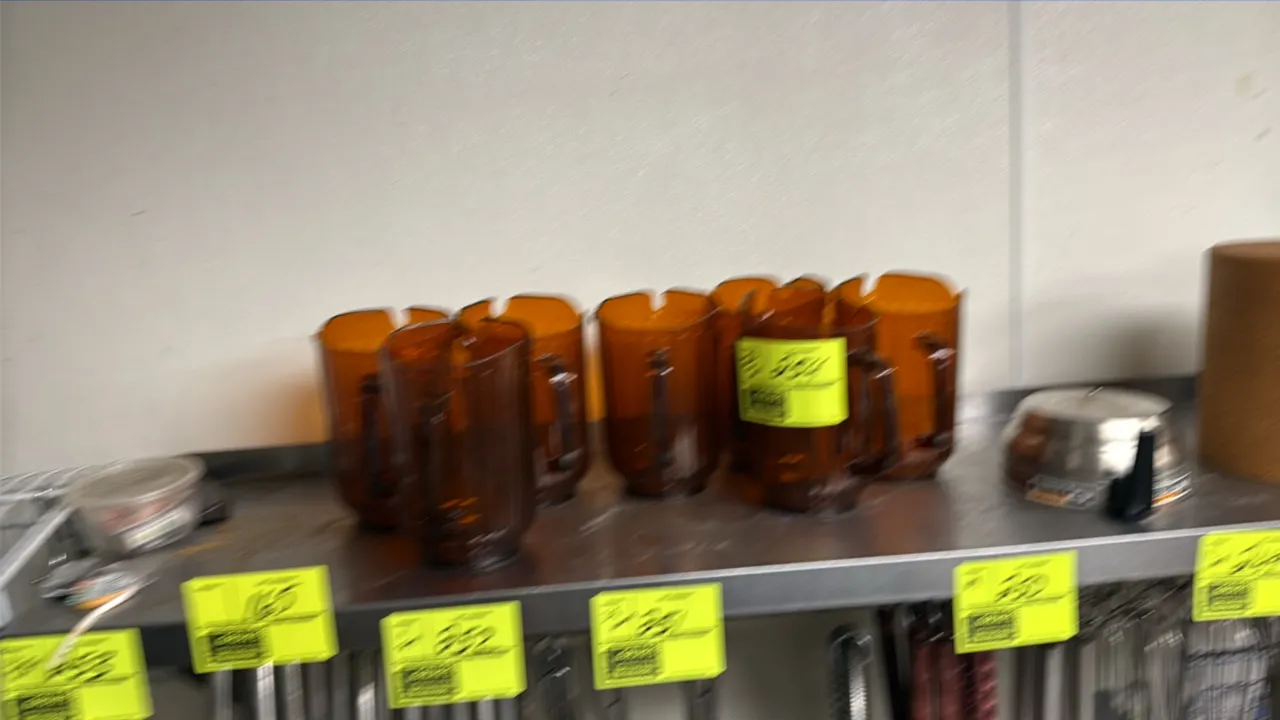 Polycarbonate beverage pitchers. Features amber fluted plastic construction with integrated handle and contoured pour spout.