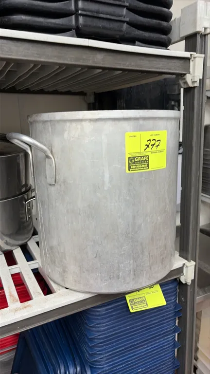 Aluminum stock pot. Features dual loop side handles. Lid not included.