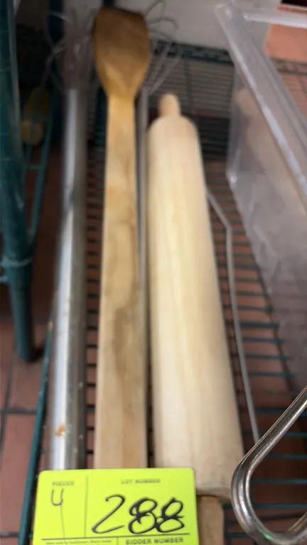 Assorted commercial kitchen utensils. Includes (1) wood rolling pin, (1) wood stirring paddle, and (2) stainless steel wire whips.