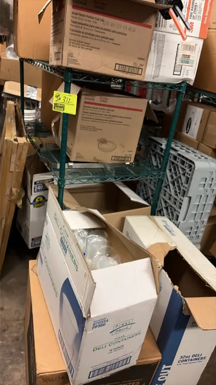Metro green wire shelving rack. Includes paper supplies, aluminum pans, and plastic deli containers. Dimensions: 48"L x 24"W x 53"H.