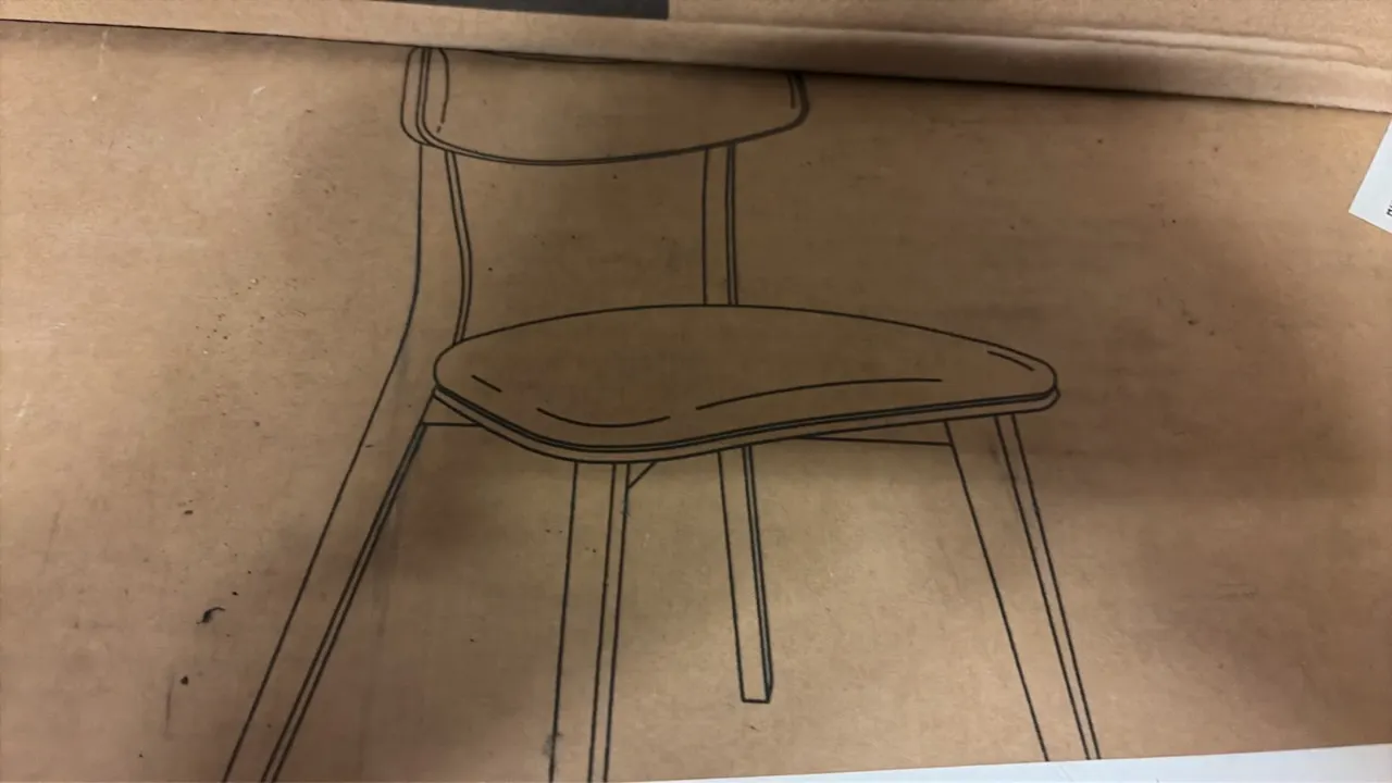 61760.00DGY dining room chairs. Features dark gray finish with wood trim. Packaged two chairs per box. New in original factory packaging.