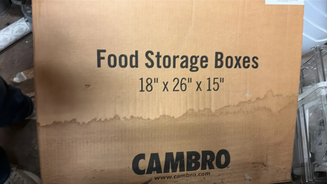 Cambro clear polycarbonate food storage box. Features clear plastic construction with ribbed bottom. 18" x 26" x 15".