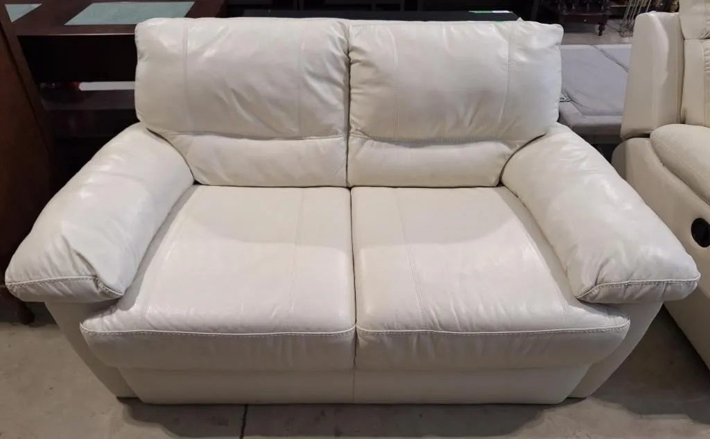 Lovely leather-like loveseat