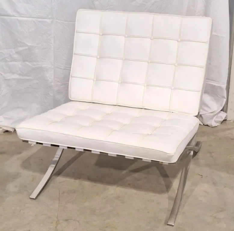 Barcelona style lounge chair; white leather-like