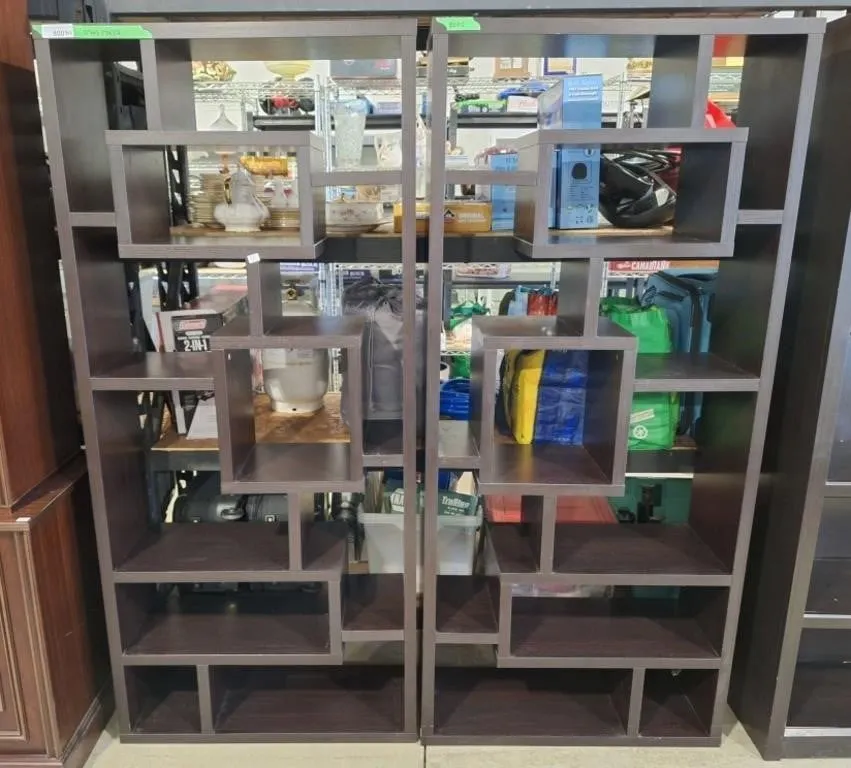 Pair of multi-tier, staggered geometric bookcases