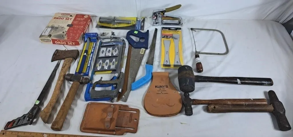 Assortment of Woodworking Tools.
Saws, Hammers,