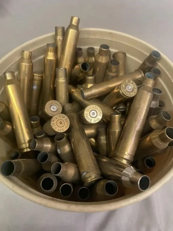 Tub of 7mm cal. brass. Weighs about 3 lbs.