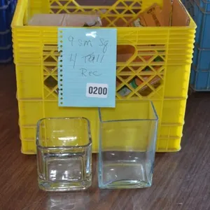 9 small square /4 tall rectangular vases