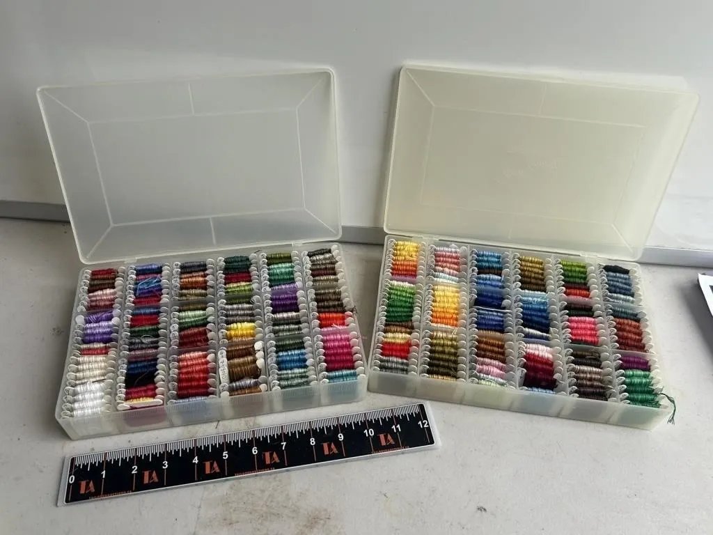 Two boxes of embroidery floss, assorted colors