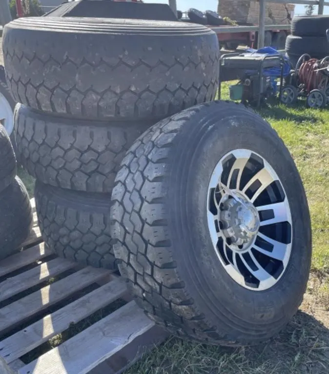 4 - Toyo M-55 LT 285/70R17 Tires On Mag Wheels