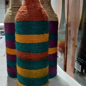 3 Yarn wrapped decor glass bottles