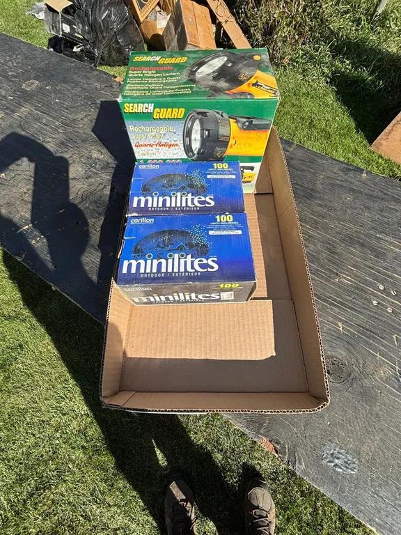 (2) BOXES OF MINI OUTDOOR LIGHTS & (1) RECHARGEABLE HALOGEN LANTERN