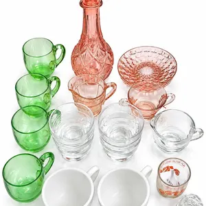 Glassware Lot Including Pink Decanter, Glass Cups, Creamer and Sugar Bowl