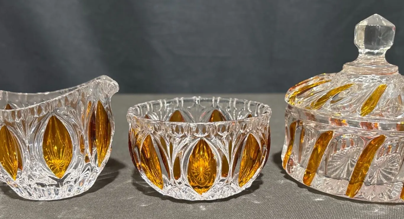 Pressed Glass Creamer, Sugar Bowl, and Lidded Dish with Amber Accents
