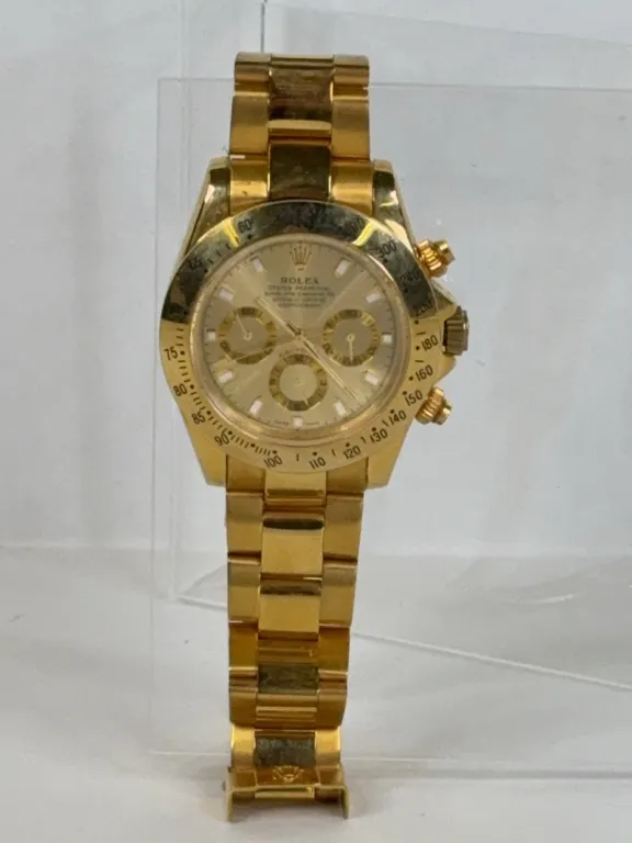 Rolex Oyster Perpetual Cosmograph Daytona Gold Tone Wristwatch