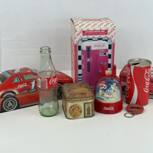 Coca-Cola Musical Vendo Bank Tins Glass Bottle and Collectibles Lot