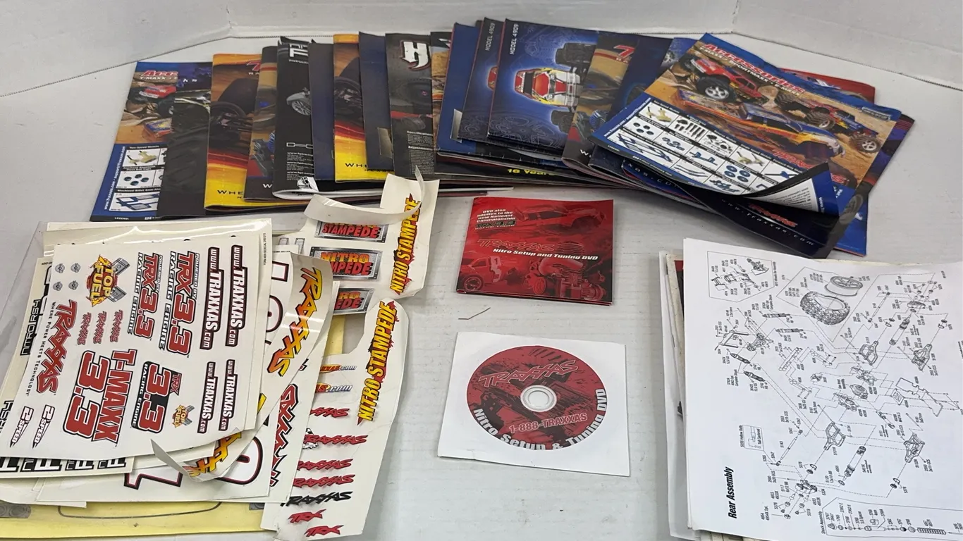Traxxas and HPI RC Manuals, Decals, and Tuning DVD Lot