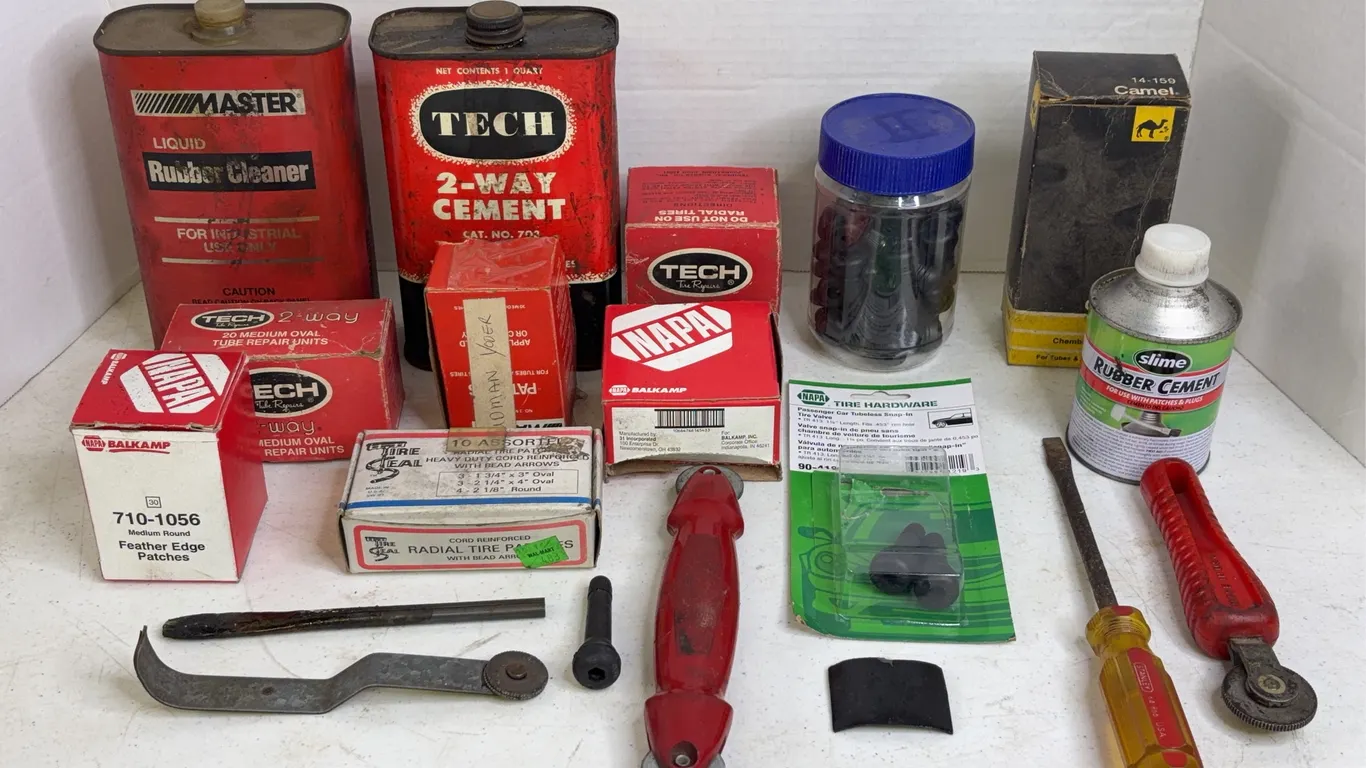 Automotive Tire Repair Lot Featuring Tech Cement Patches and Hand Tools