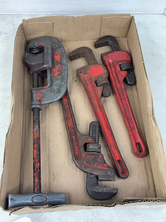 Assorted Plumbing Tools Including Ridgid Pipe Cutter and Wrenches