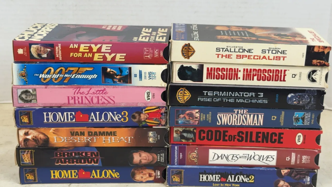 Collection of Classic VHS Tapes Including Action and Family Films