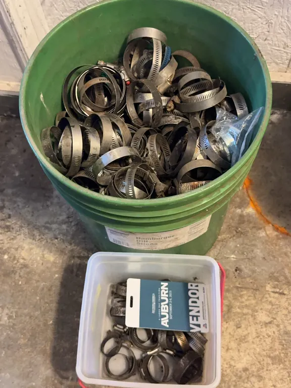 Bulk Lot of Assorted Metal Hose Clamps With Pails