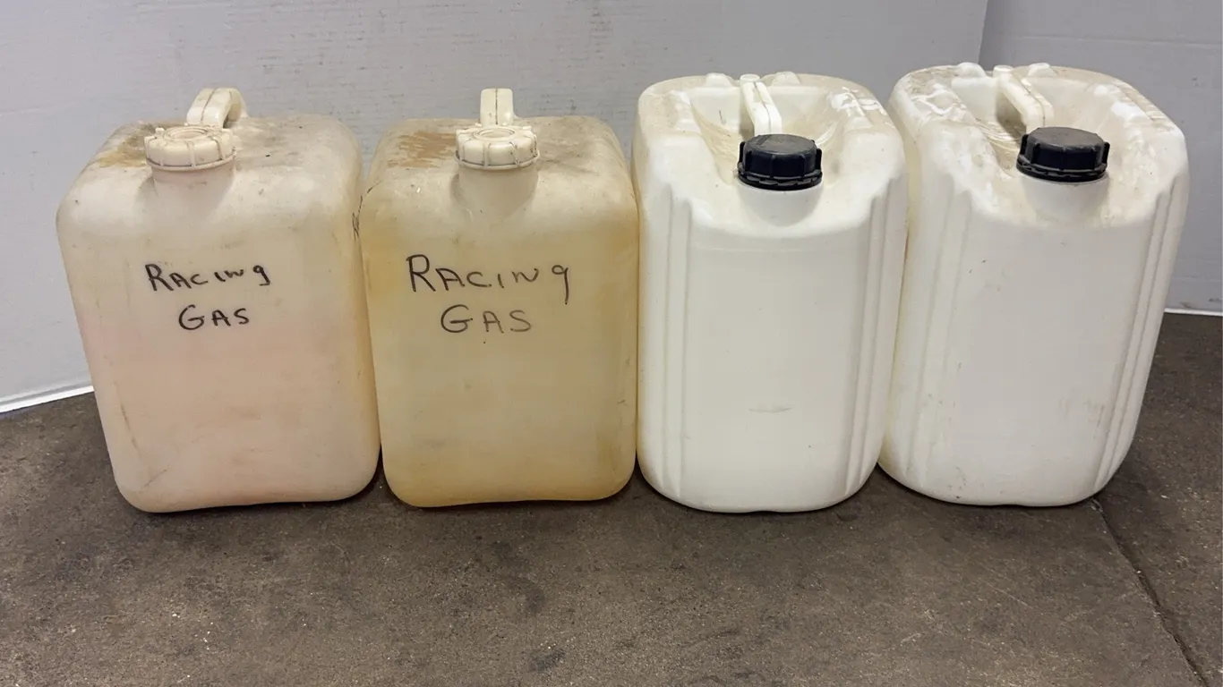 Four Polyethylene 5 Gallon Utility Jugs and Chemical Containers
