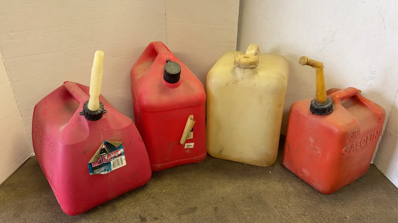 Plastic Fuel Canisters and Utility Jugs Four Piece Lot