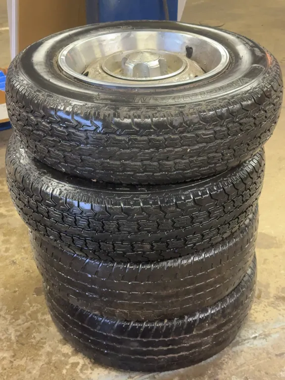 Set of Four Virginian Steel Belted Radial Tires With Wheel