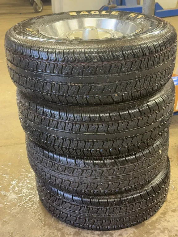 Goodyear Eagle ST P215/70R14 Tires and Wheels Set of Four