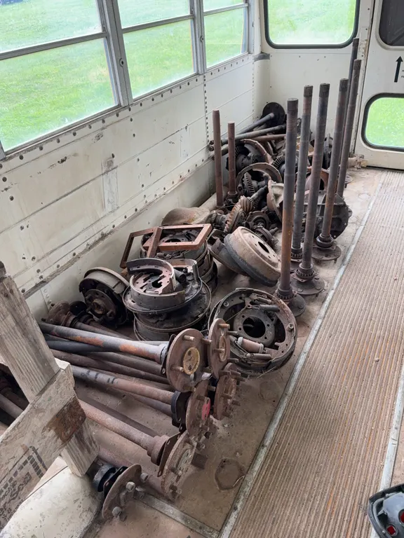 Large Assortment of Automotive Axle Shafts Differential Third Members and Drum Brakes