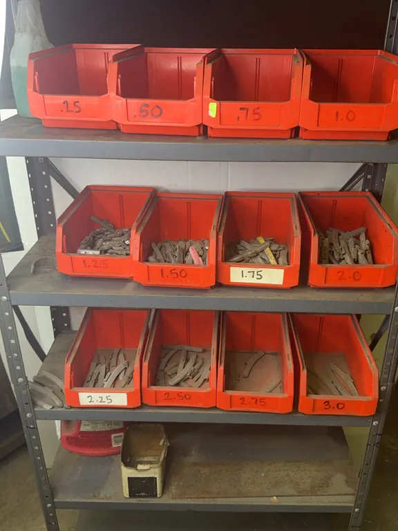 Multi-Tier Industrial Steel Shelving Unit with Parts Bins and Wheel Weights