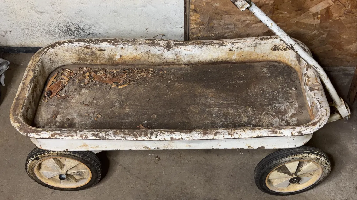 Antique Pressed Steel Coaster Wagon Pull Toy With Solid Wheels