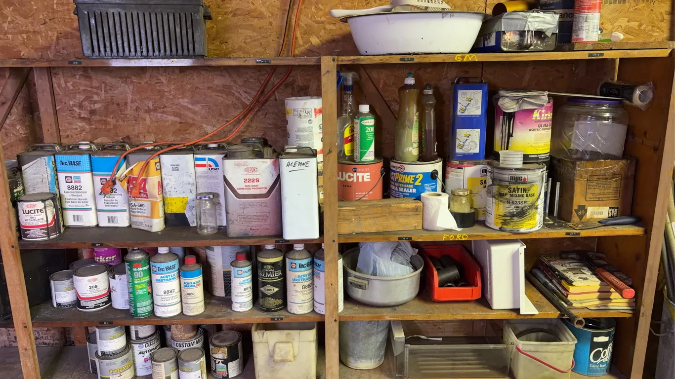 Workshop Contents Featuring Automotive Paint Solvents and Wooden Shelving Unit