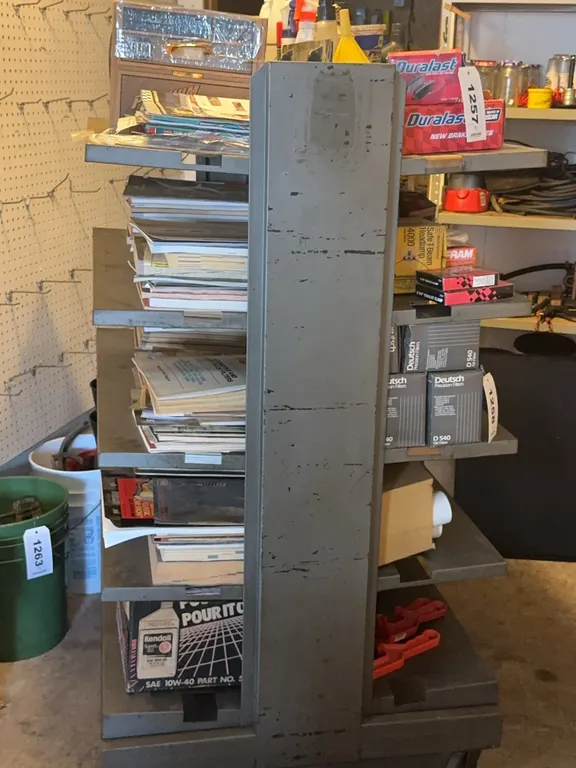 Industrial Rolling Metal Utility Cart With Automotive Manuals and Parts