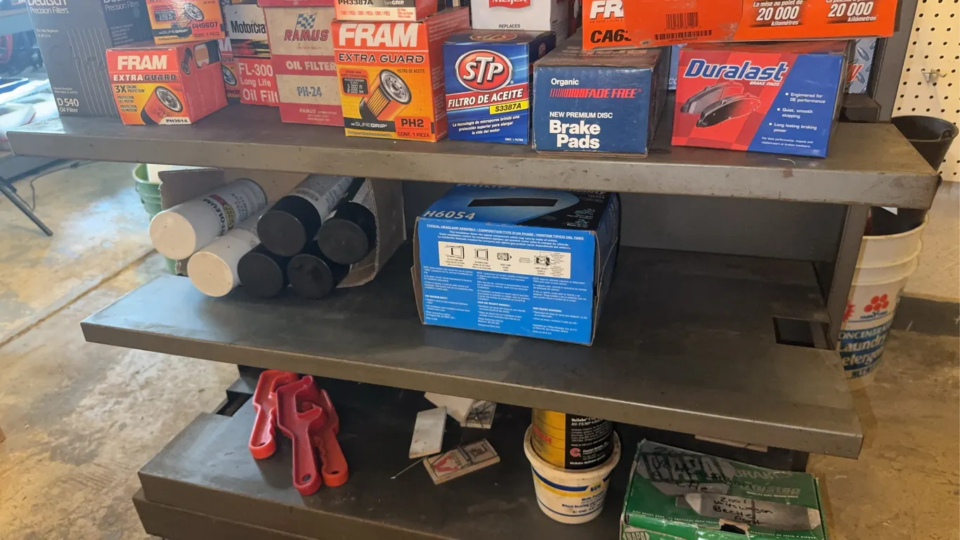 Automotive Parts Lot with Oil Filters Brake Pads and Headlamp