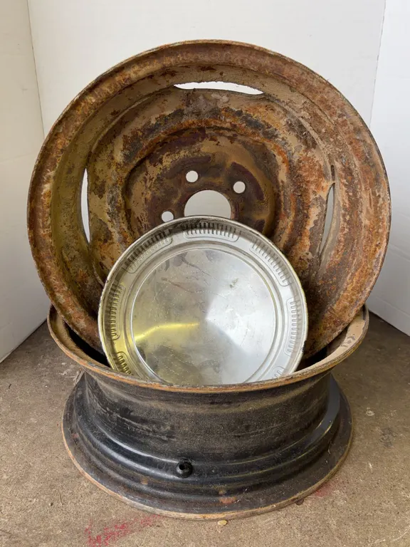 Pair of Steel Automotive Wheel Rims with Hubcaps