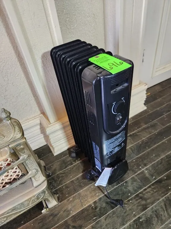 Electric Black Heater on Rollers