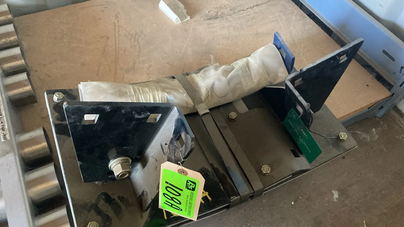 Adjustable Skid Shoe For a 972