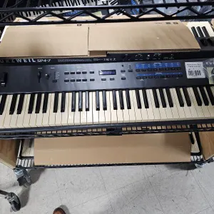 Kurzweil Sp4-7 76-Key Stage Piano with Keyboard and AC Adapter