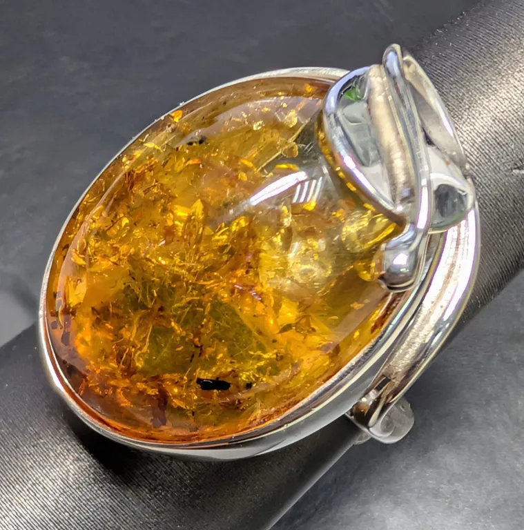 SILVER(9.55G), AMBER RING, SIZE , SUGGESTED RETAIL VALUE $300