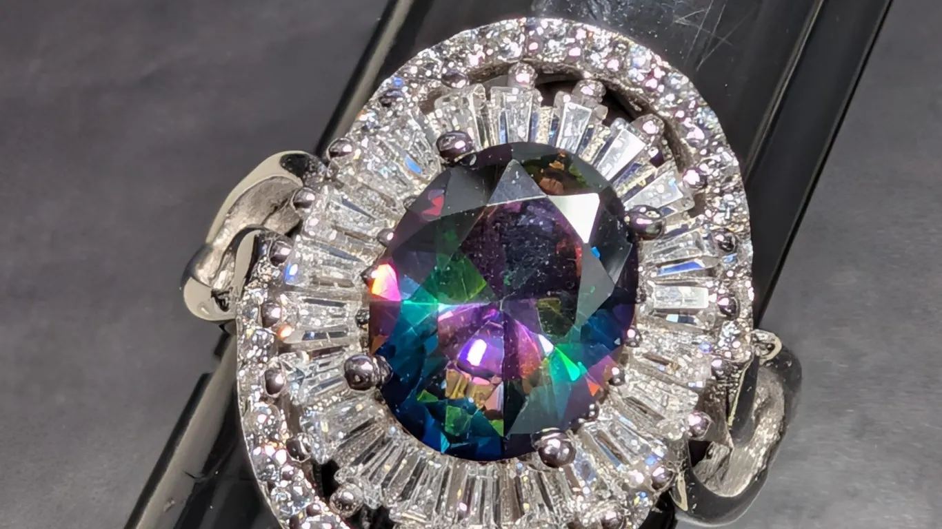 SILVER(4.45G), MYSTIC TOPAZ CZ (APP 2CT)RING, SIZE 6.5, SUGGESTED RETAIL VALUE $400