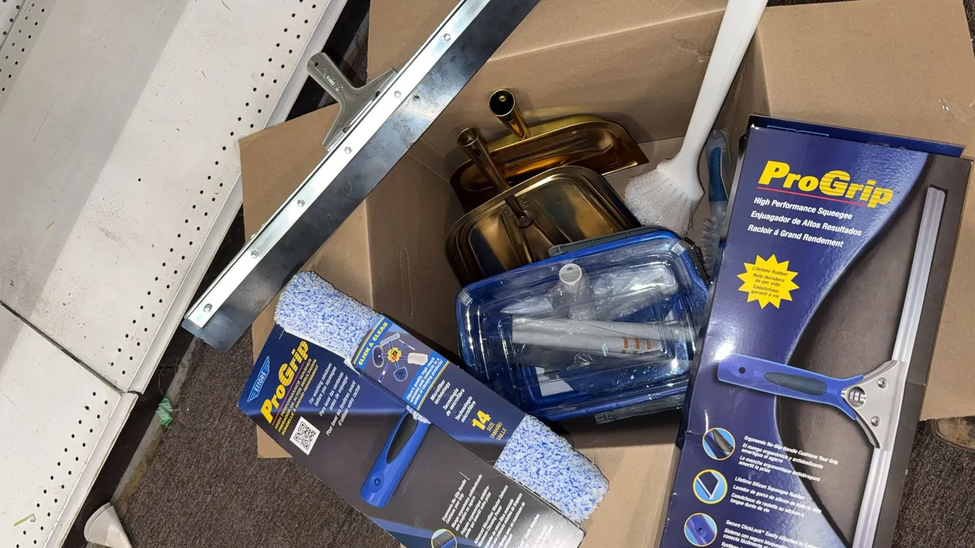 Box of scrubbers squeegee, heads, and dustpan