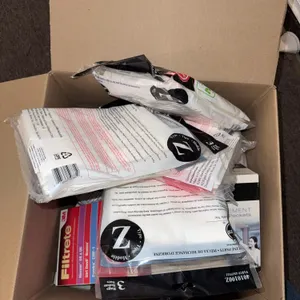Box of vacuum bags, and filters, different sizes and makes