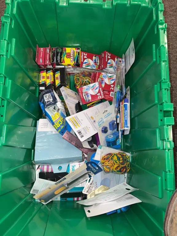 Miscellaneous lot of office supplies, crayons, rubber bands, pencil sharpeners