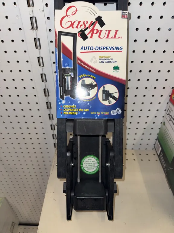 Easy pull auto dispensing can crusher