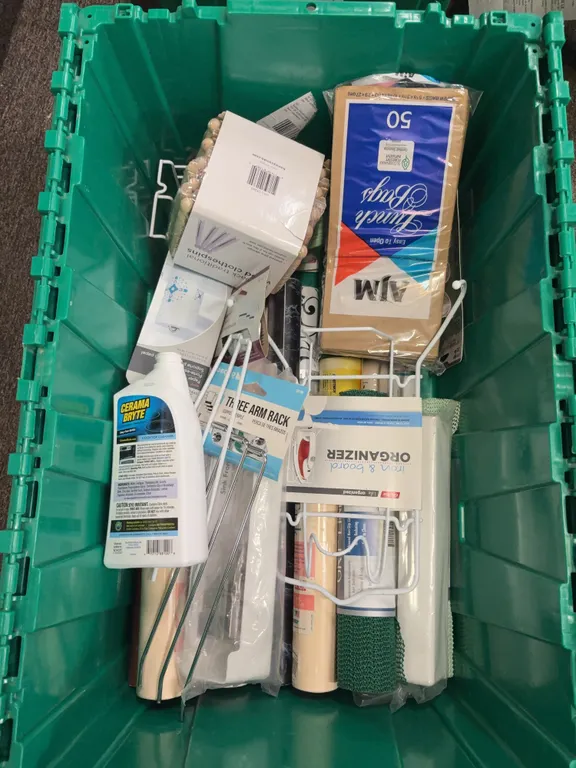 assorted box of cushion, nonslip liners, paper towel holders, wood clothes pins content only